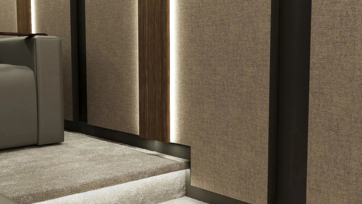 Cinema Interior - Richmond Fabric Walls - In this design we have combined Camira Blazer Lite Daydream with walnut finished backlit columns and rich dark paint on the walls