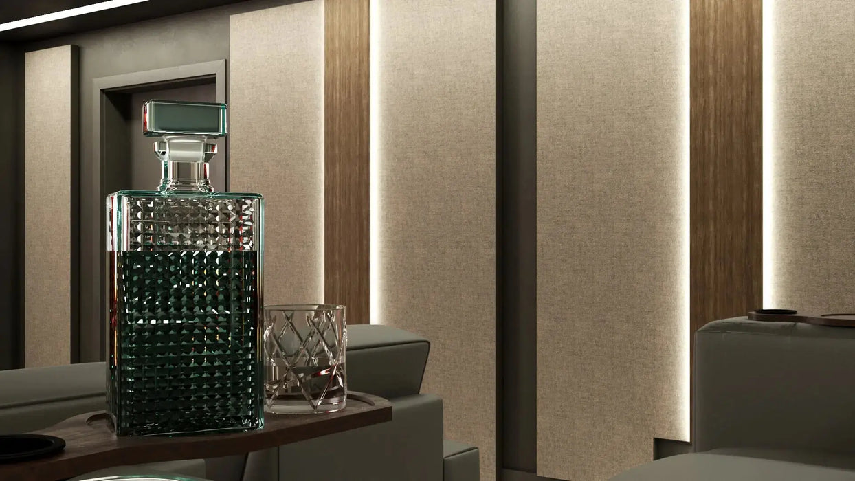 Cinema Interior - Richmond Fabric Walls - In this design we have combined Camira Blazer Lite Daydream with walnut finished backlit columns and rich dark paint on the walls