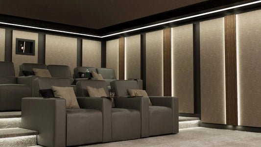 Cinema Interior - Richmond Fabric Walls - In this design we have combined Camira Blazer Lite Daydream with walnut finished backlit columns and rich dark paint on the walls